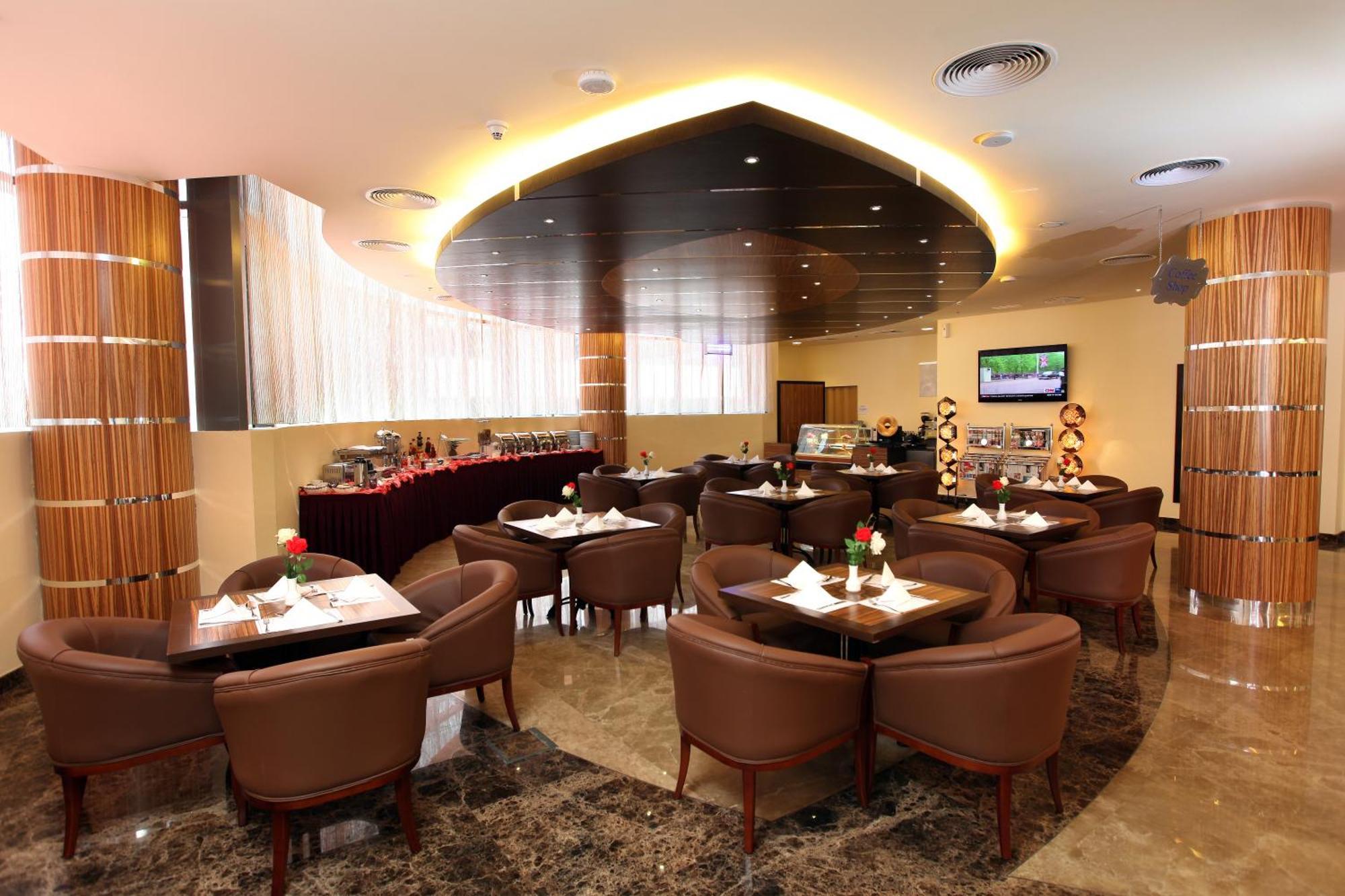 精致梅普尔斯酒店式公寓 迪拜 餐厅 照片
